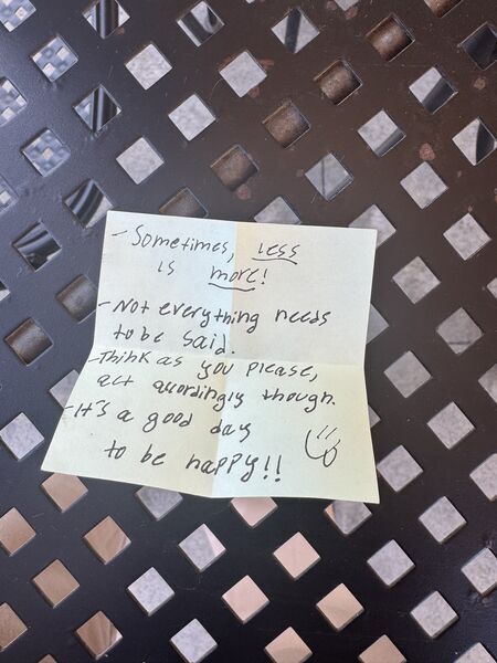 Handwritten sticky note with words of encouragement
